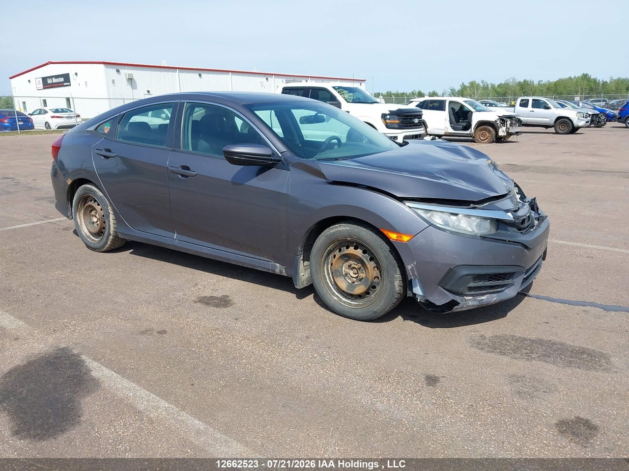2HGFC2E53HH023976 · 2017 HONDA CIVIC LX