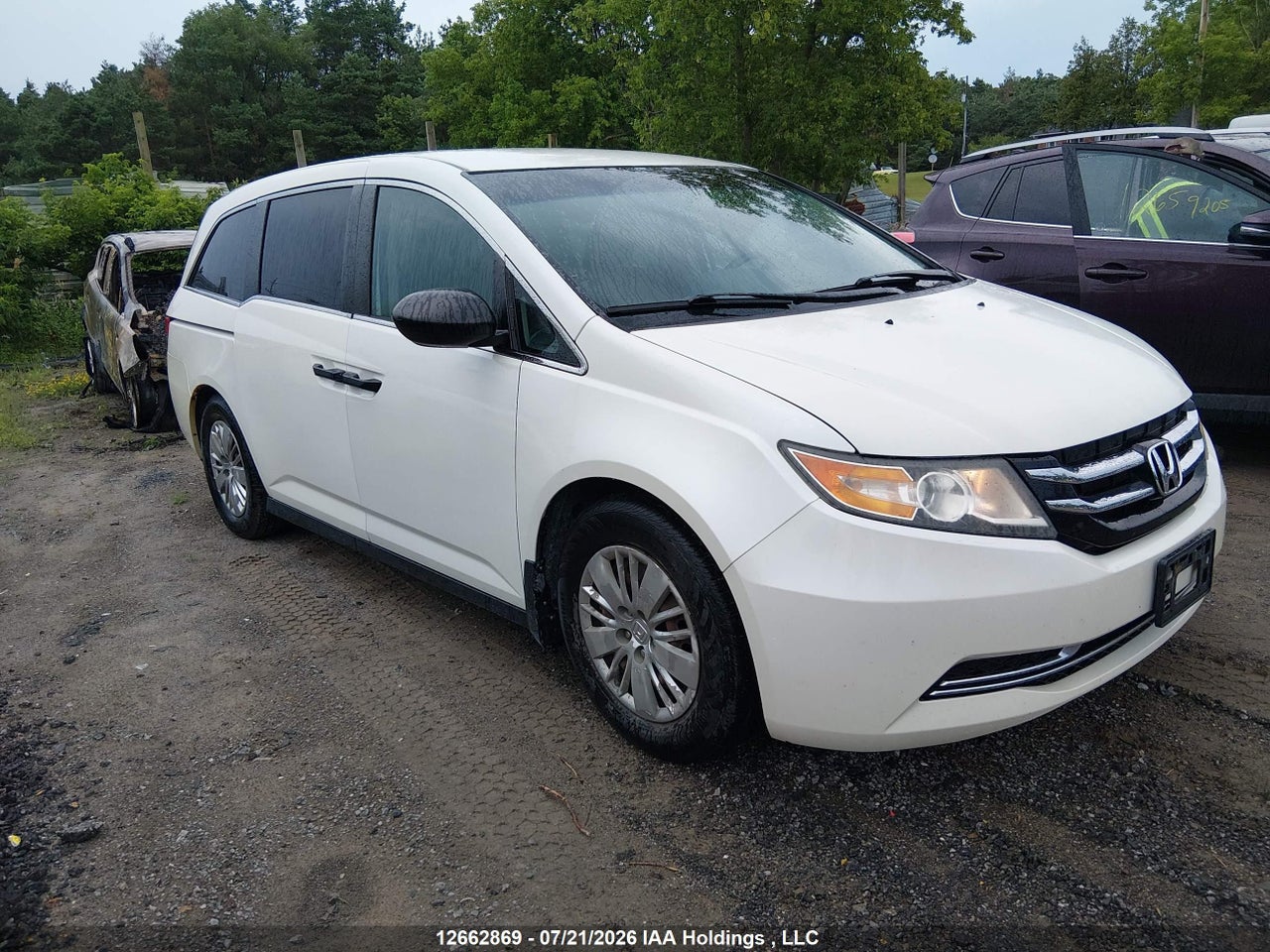 5FNRL5H26EB506023 · 2014 HONDA ODYSSEY LX