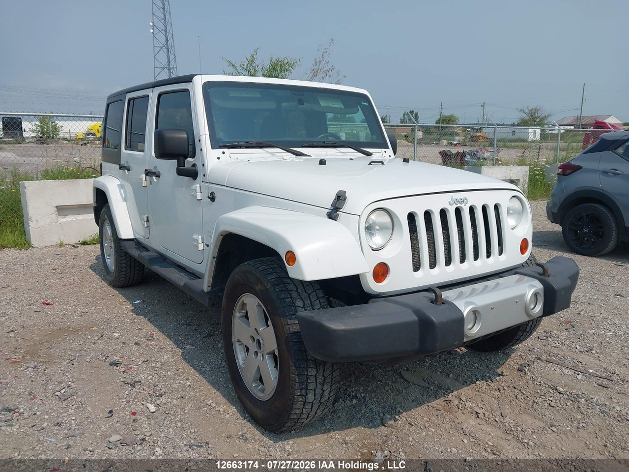 1J4BA5H15BL555165 · 2011 JEEP WRANGLER UNLIMITED SAHARA