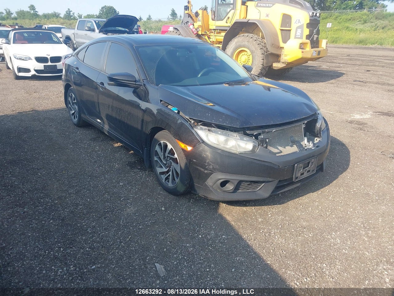 2HGFC2F71GH037552 · 2016 HONDA CIVIC EX