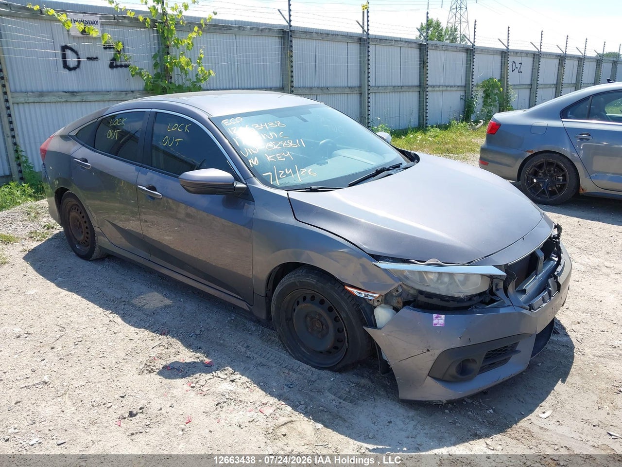 2HGFC2F59HH028811 · 2017 HONDA CIVIC LX