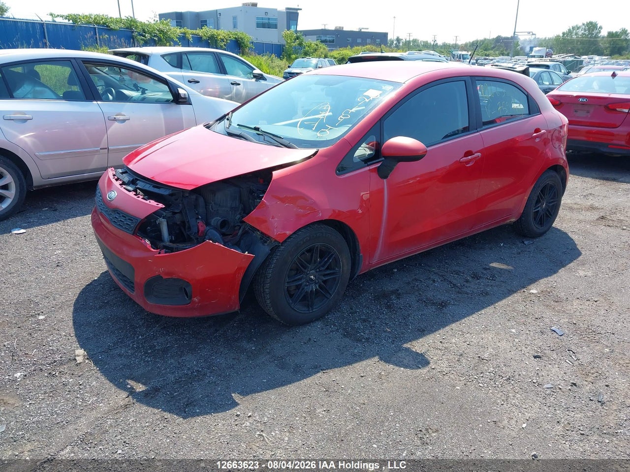 KNADM5A31C6759704 · 2012 KIA RIO LX · 2/21