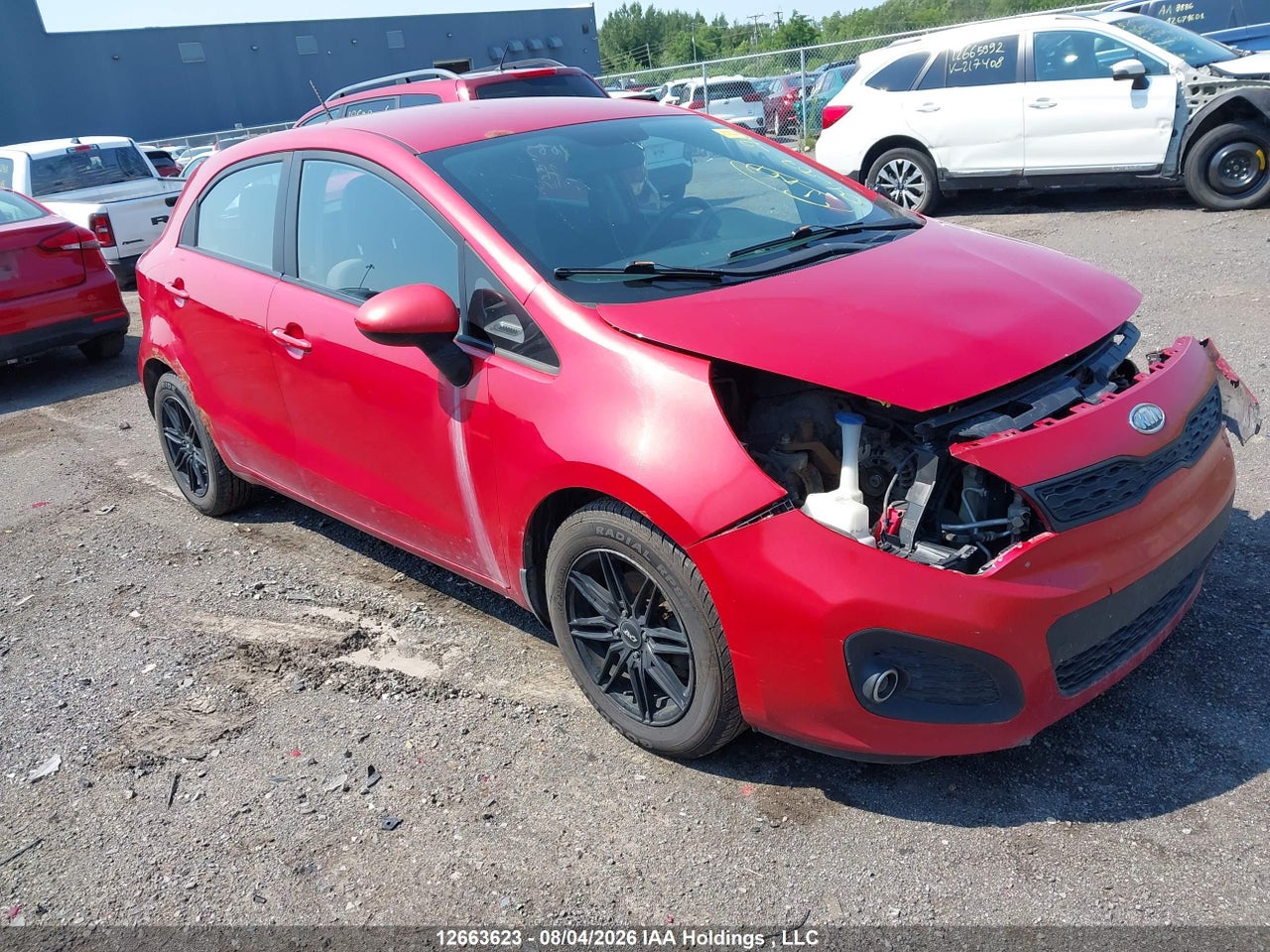 KNADM5A31C6759704 · 2012 KIA RIO LX