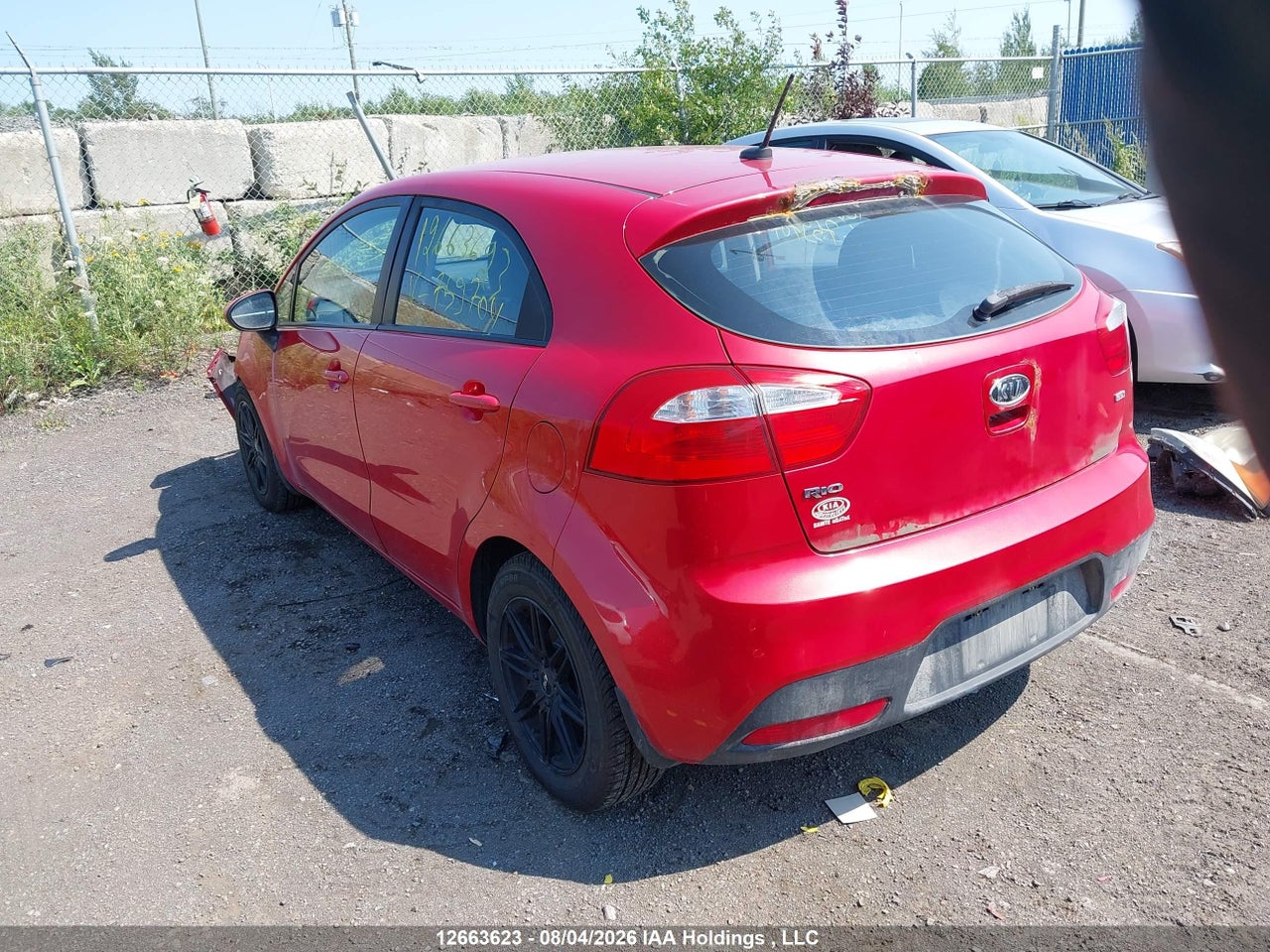 KNADM5A31C6759704 · 2012 KIA RIO LX · 3/21