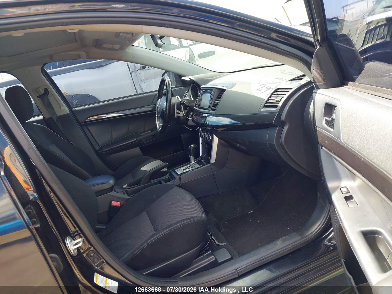 JA32U8FW4GU604630 · 2016 MITSUBISHI LANCER GT · 5/16