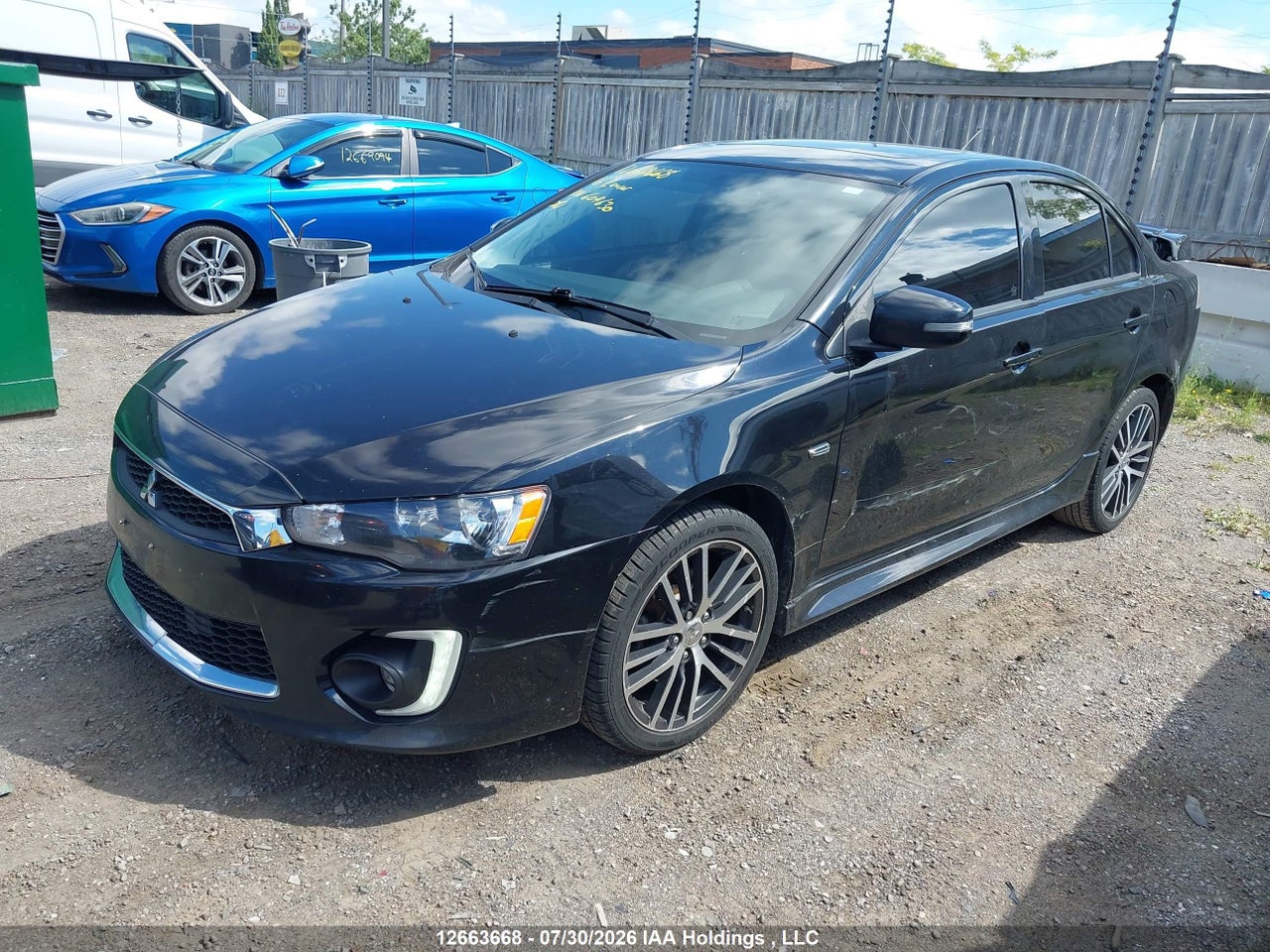 JA32U8FW4GU604630 · 2016 MITSUBISHI LANCER GT · 2/16