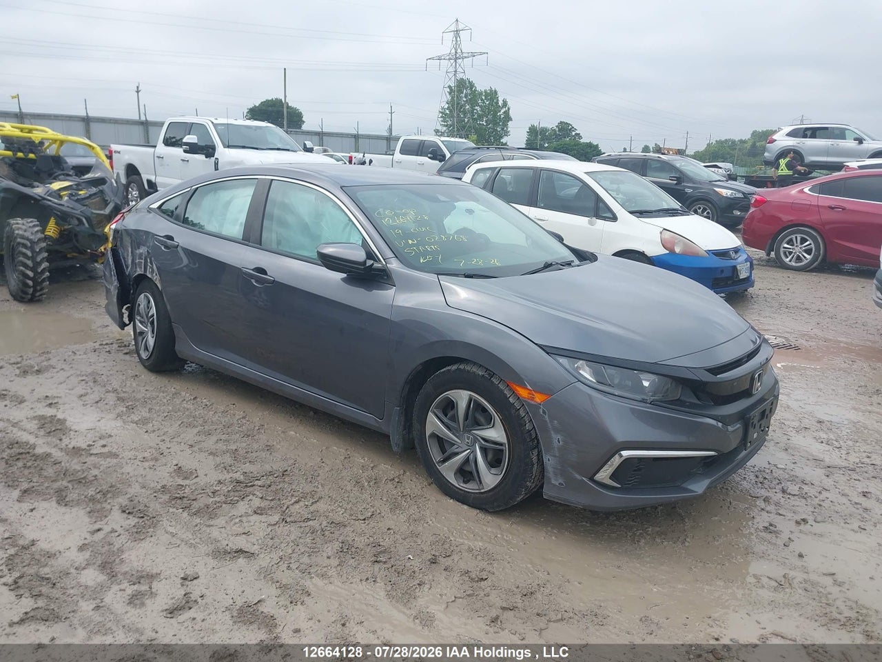 2HGFC2F52KH028768 · 2019 HONDA CIVIC LX