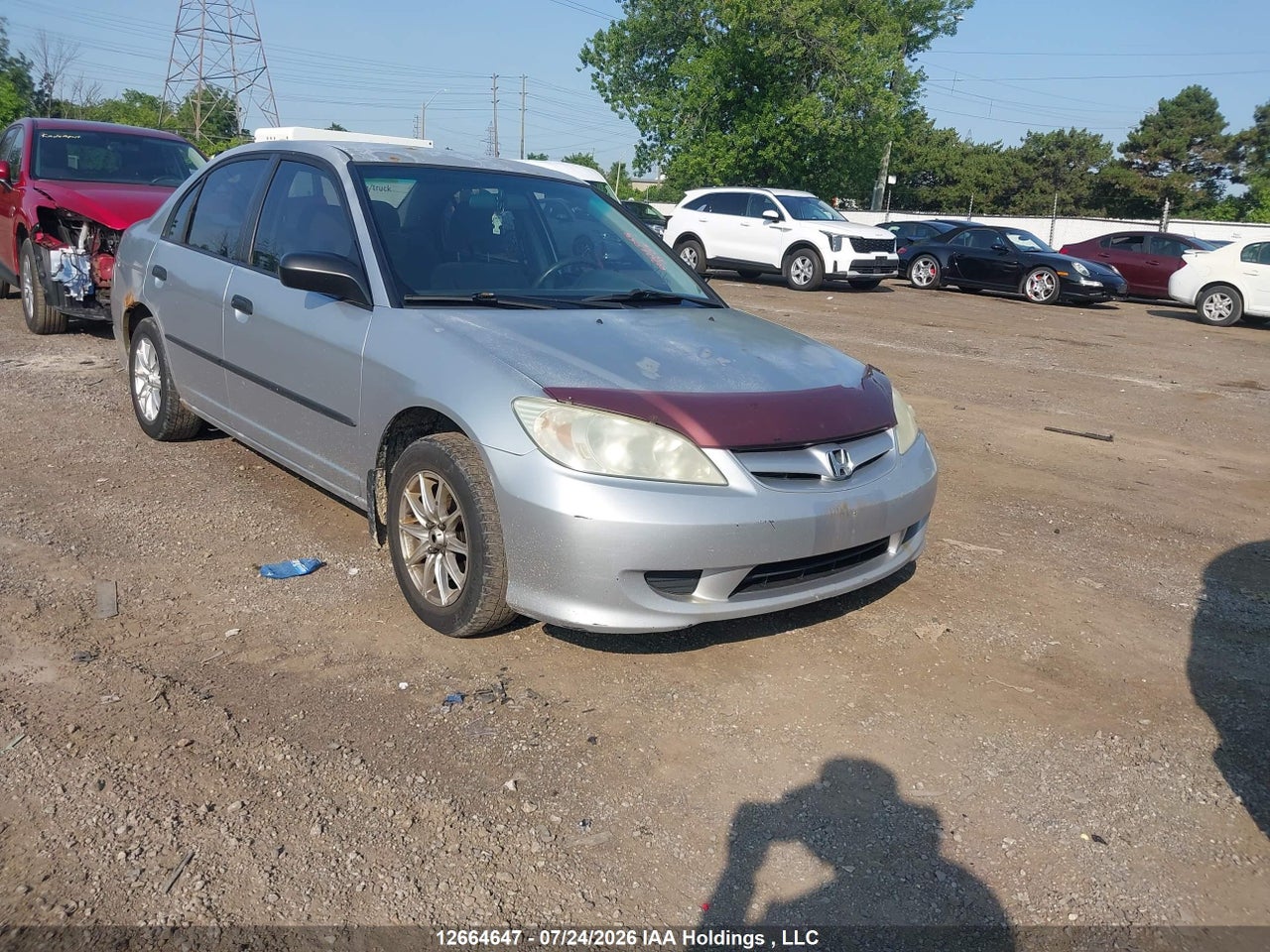 2HGES15395H002889 · 2005 HONDA CIVIC DX VP