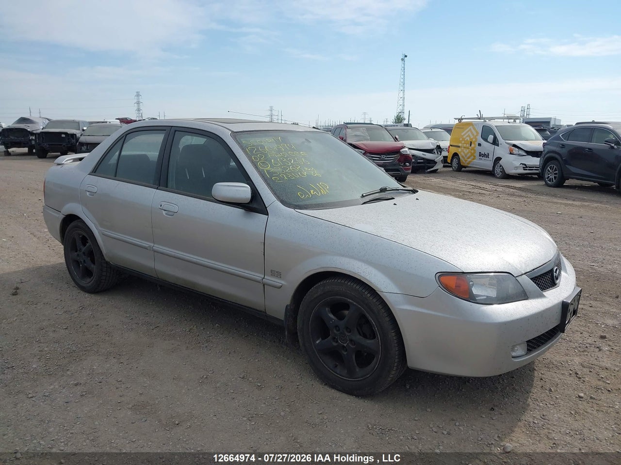 JM1BJ225121613266 · 2002 MAZDA PROTEGE ES/LX
