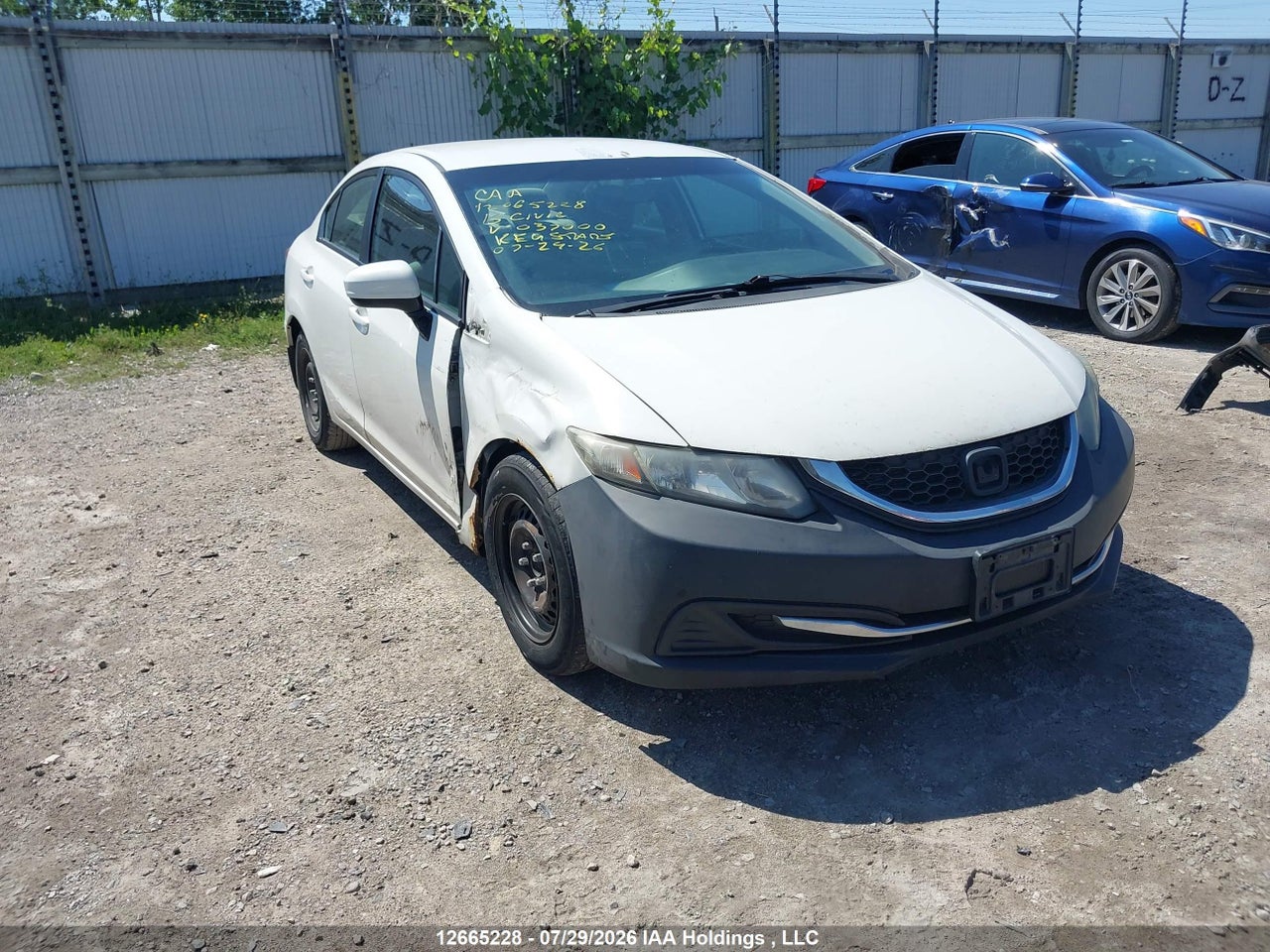 2HGFB2F47FH037000 · 2015 HONDA CIVIC LX