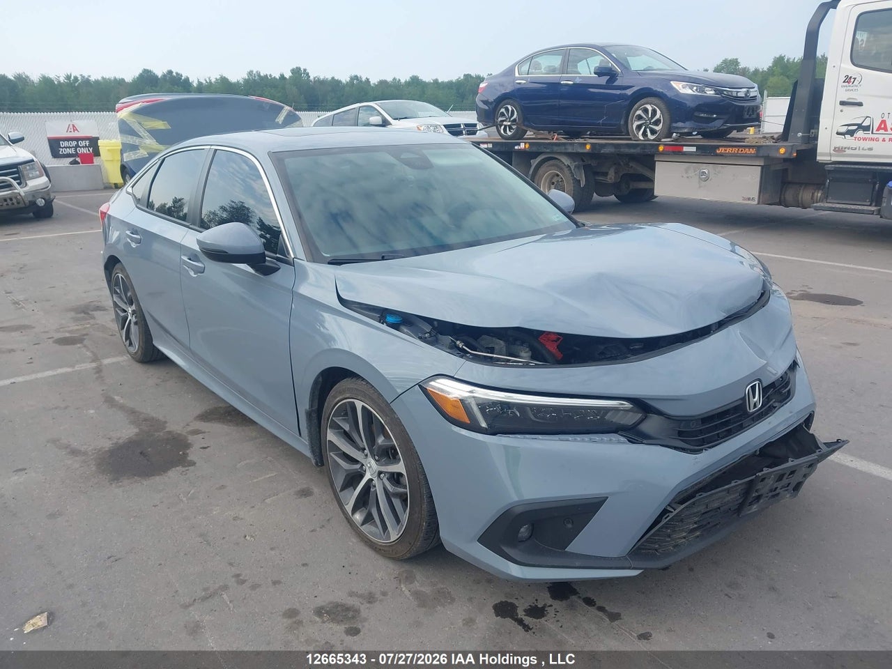 2HGFE1F97PH000320 · 2023 HONDA Civic touring