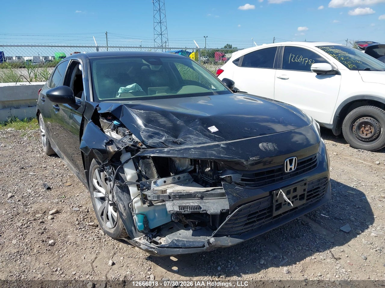2HGFE2F21NH105926 · 2022 HONDA CIVIC LX