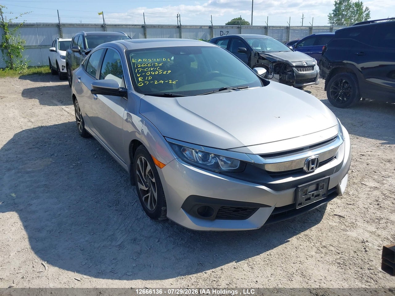 2HGFC2F83HH040589 · 2017 HONDA CIVIC EX