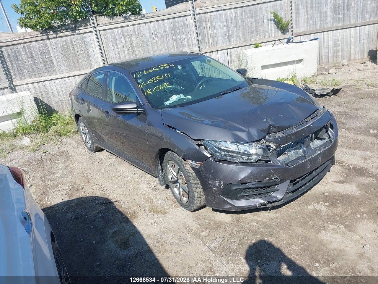 2HGFC2F52JH036111 · 2018 HONDA CIVIC LX