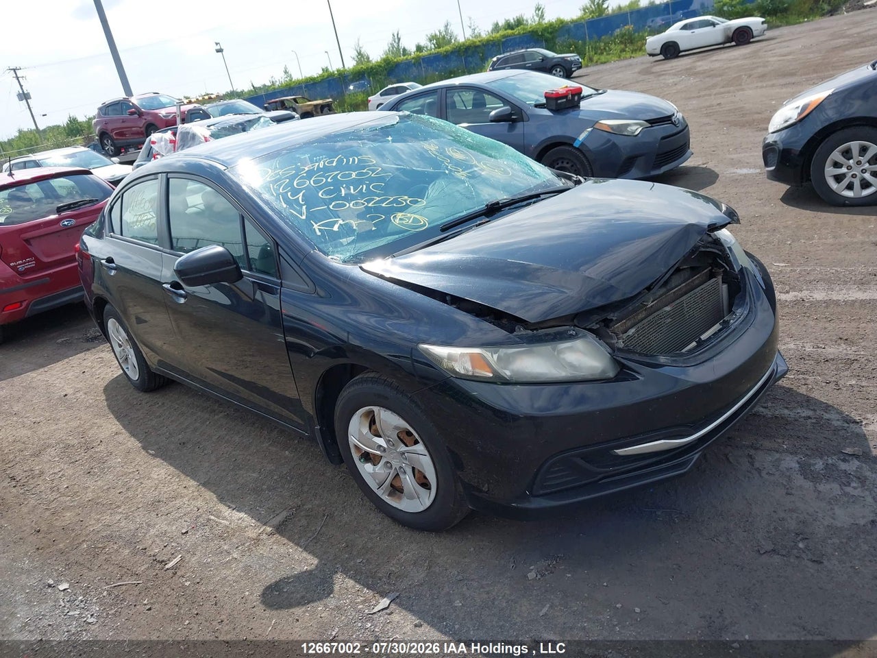 2HGFB2F45EH002230 · 2014 HONDA CIVIC LX
