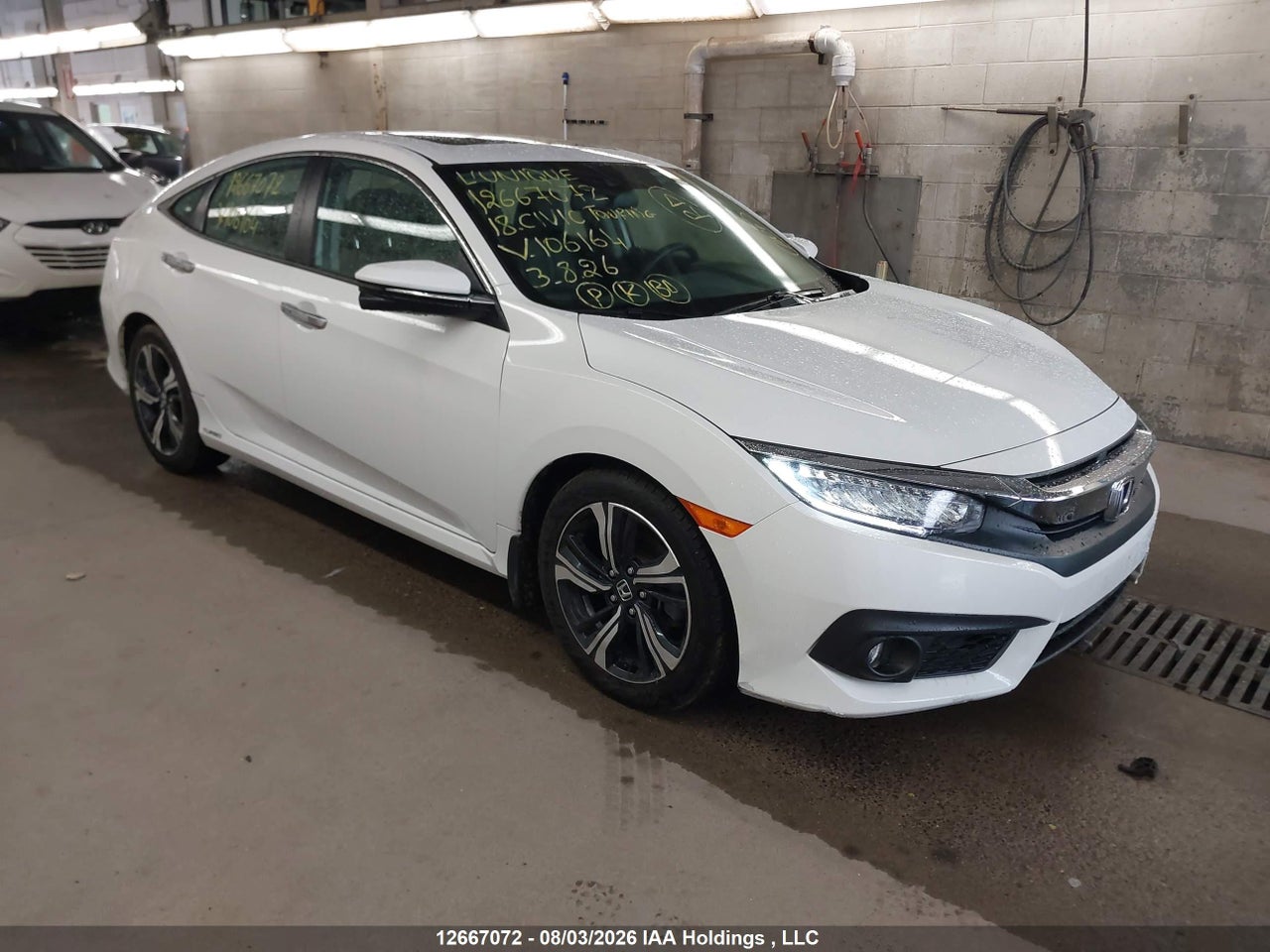 2HGFC1F95JH106164 · 2018 HONDA Civic touring