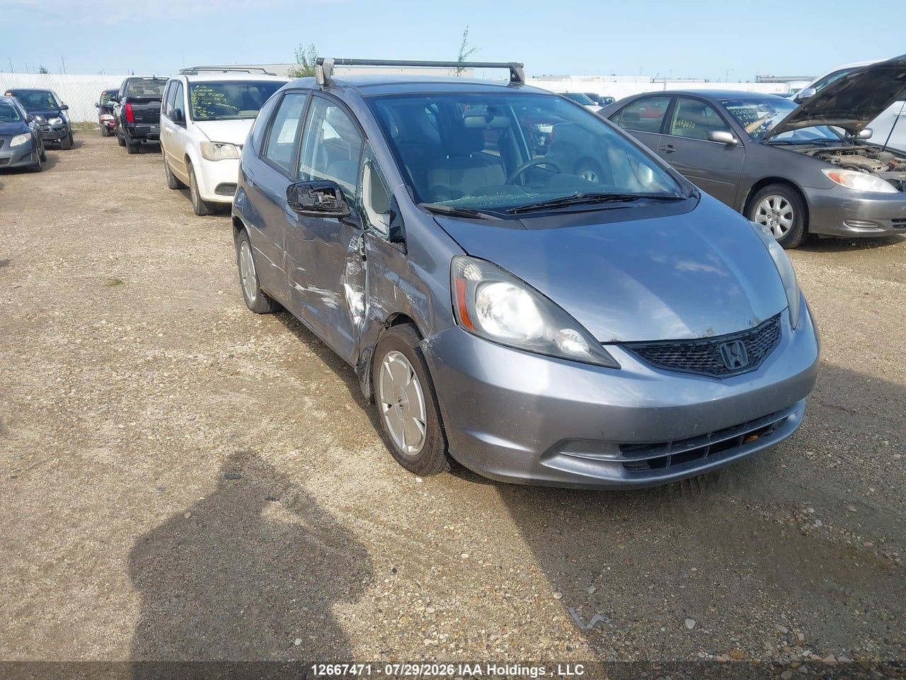 JHMGE8H5XAC801225 · 2010 HONDA FIT LX