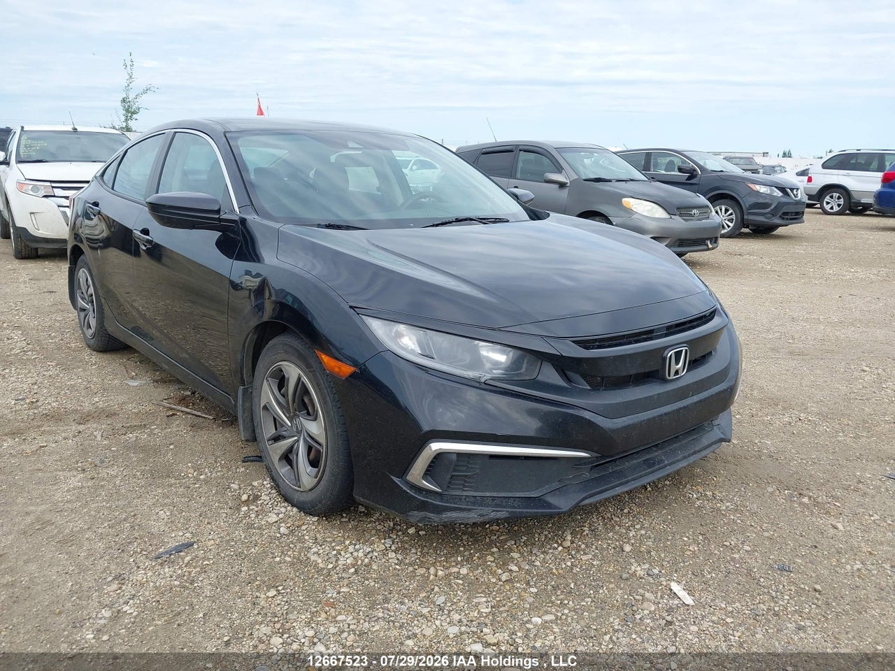 2HGFC2F55KH007140 · 2019 HONDA CIVIC LX