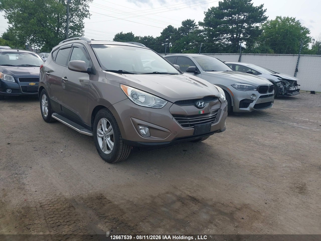 KM8JUCAC6DU715720 · 2013 HYUNDAI TUCSON GLS/LIMITED