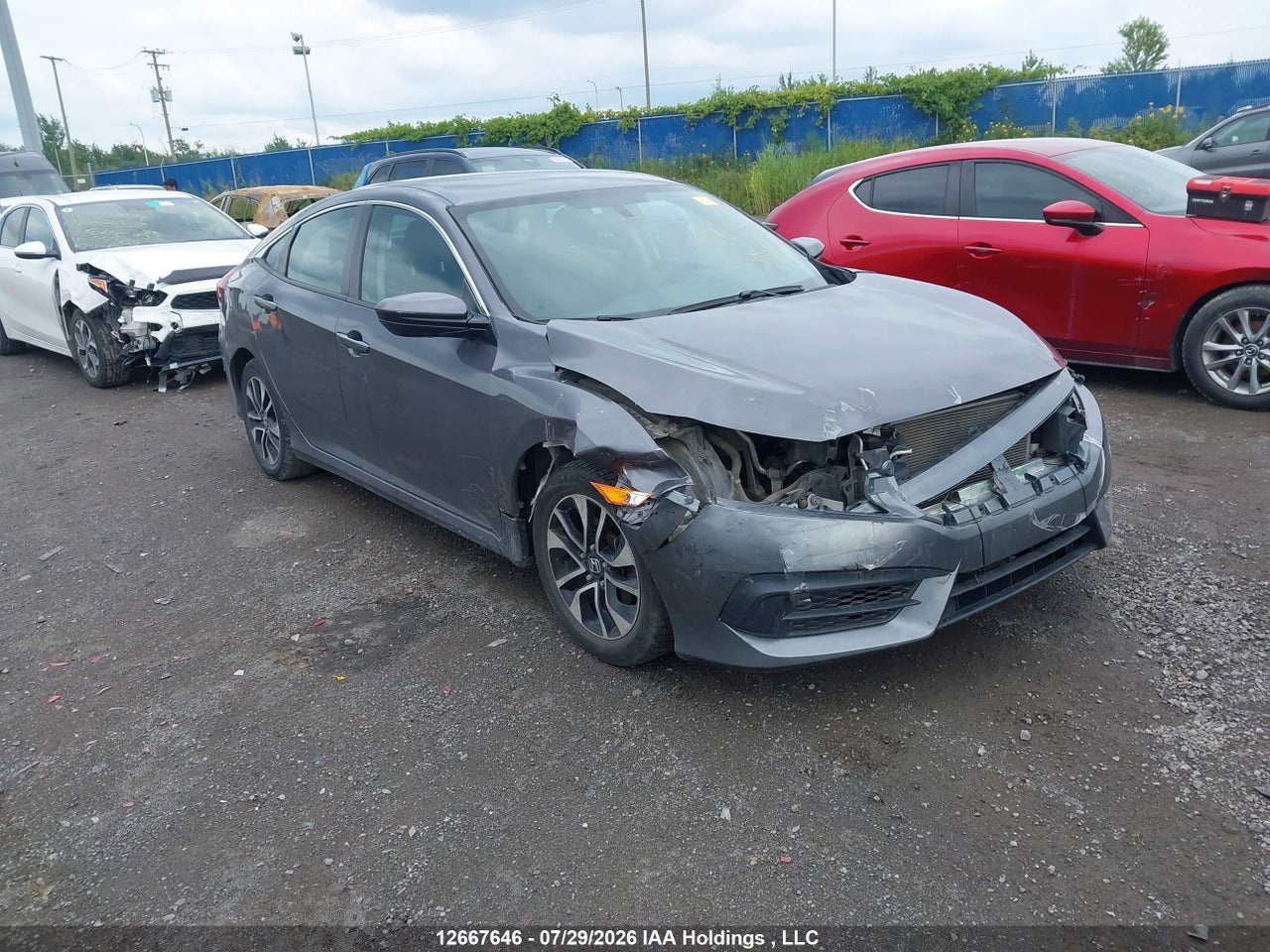 2HGFC2F56JH007890 · 2018 HONDA CIVIC LX