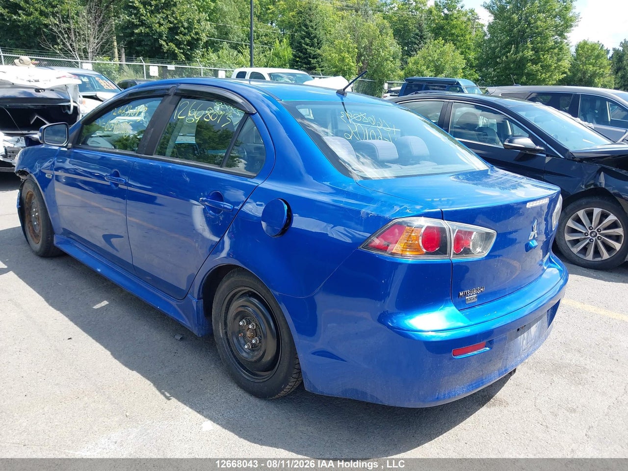 JA32V2FW0HU601056 · 2017 MITSUBISHI LANCER · 3/16