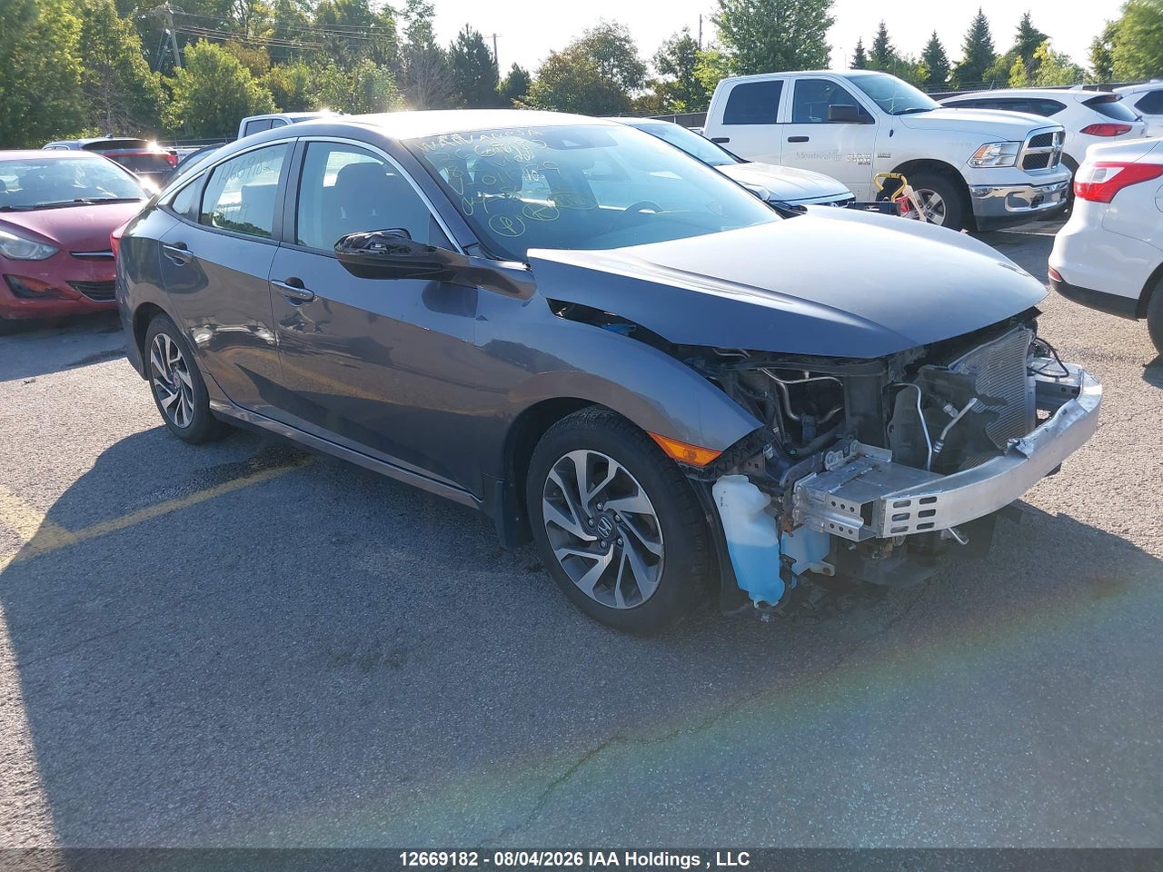 2HGFC2F60JH011779 · 2018 HONDA CIVIC SE