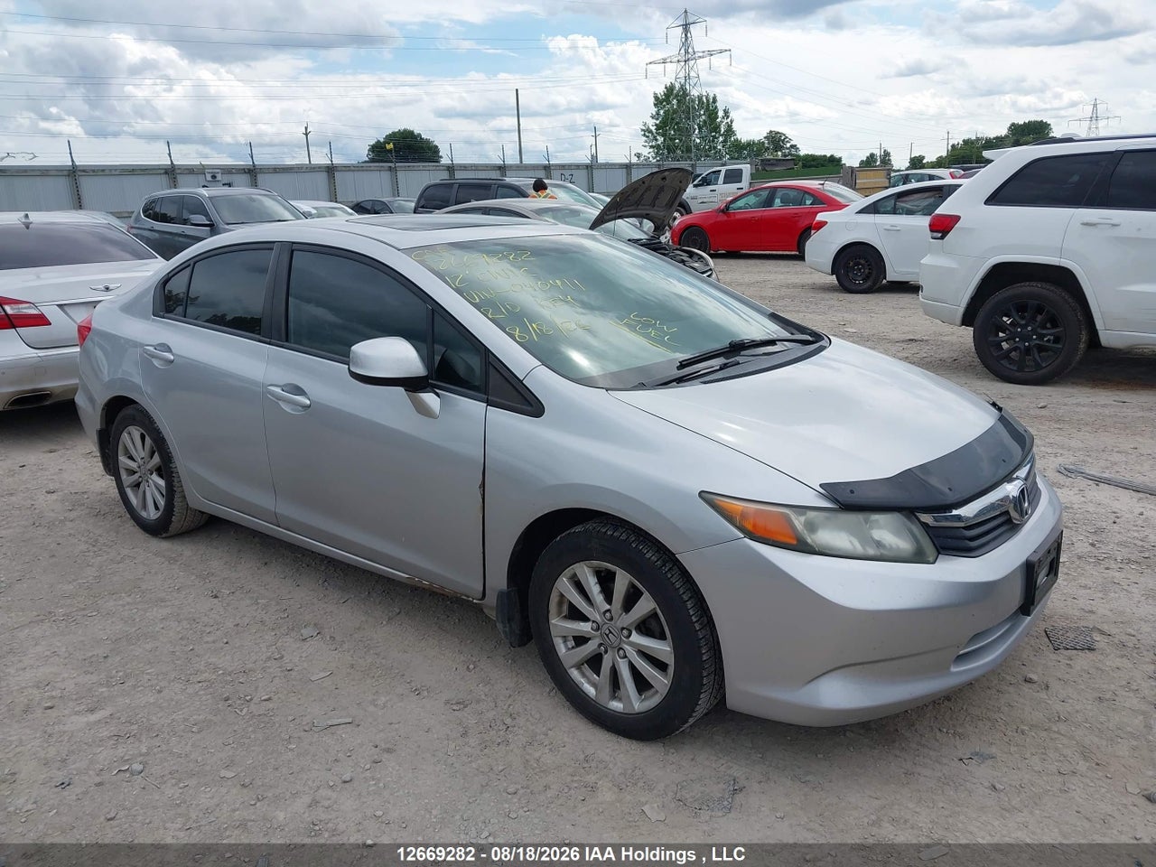 2HGFB2F54CH040411 · 2012 HONDA CIVIC LX