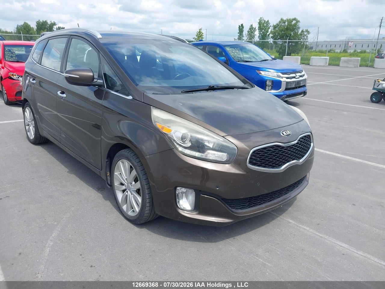 KNAHU8A30F7077432 · 2015 KIA RONDO
