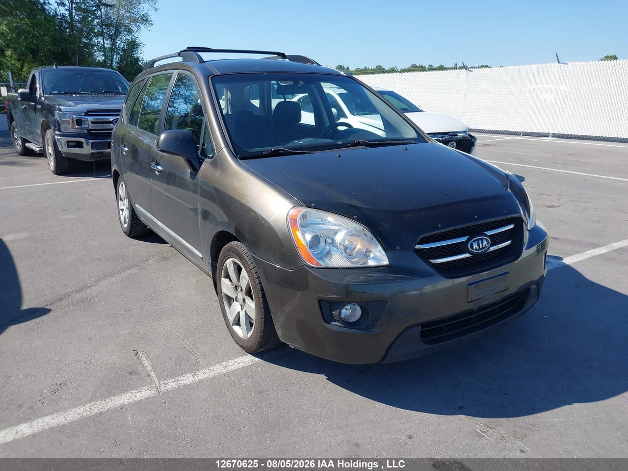 KNAFG526197270411 · 2009 KIA RONDO LX/EX