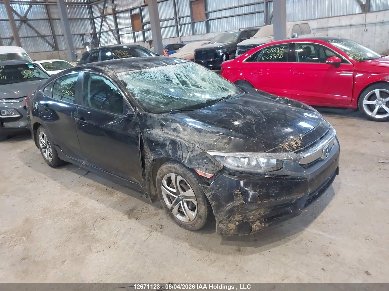 2HGFC2E57JH039684 · 2018 HONDA CIVIC LX