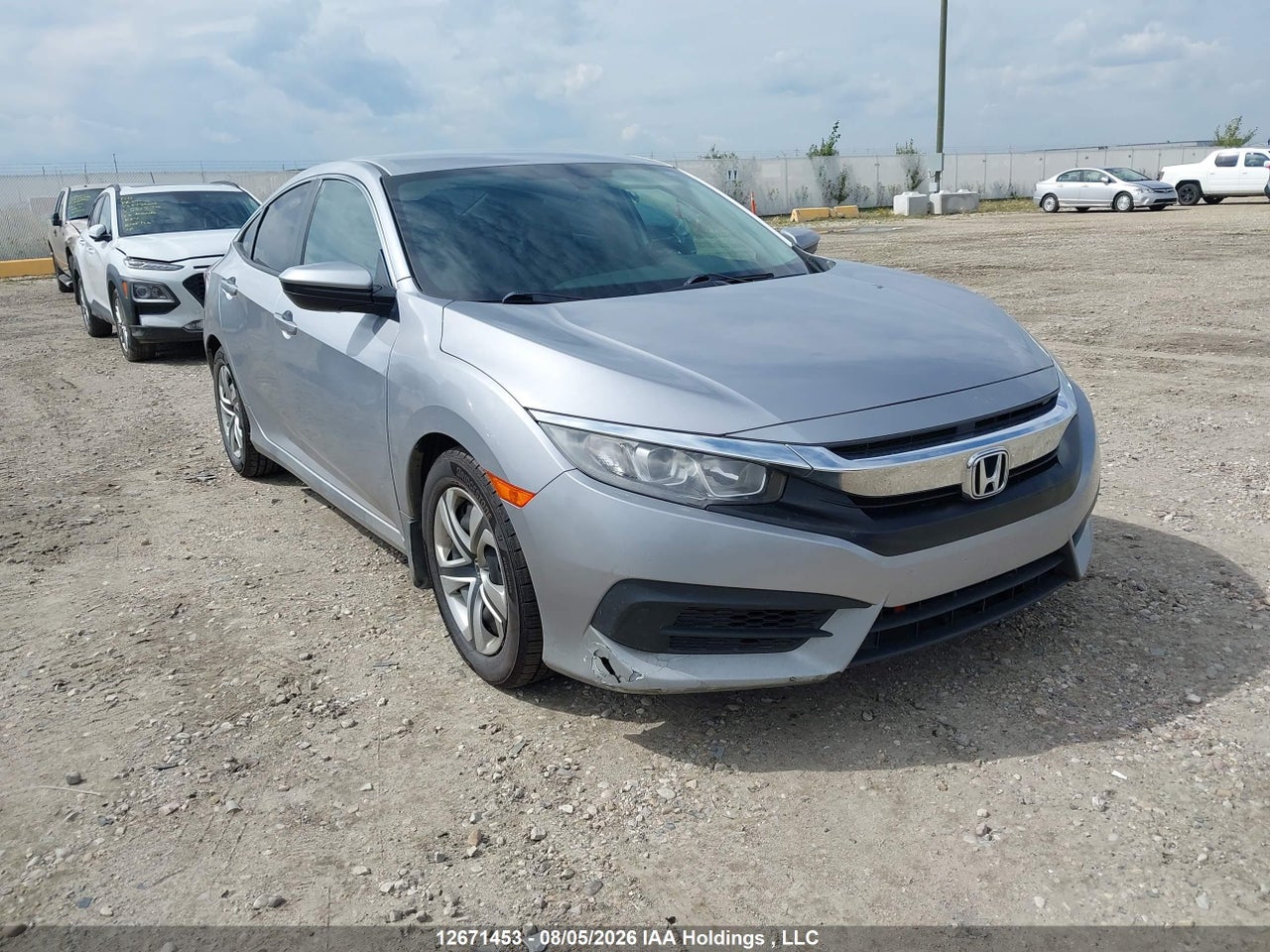2HGFC2F59HH006386 · 2017 HONDA CIVIC LX