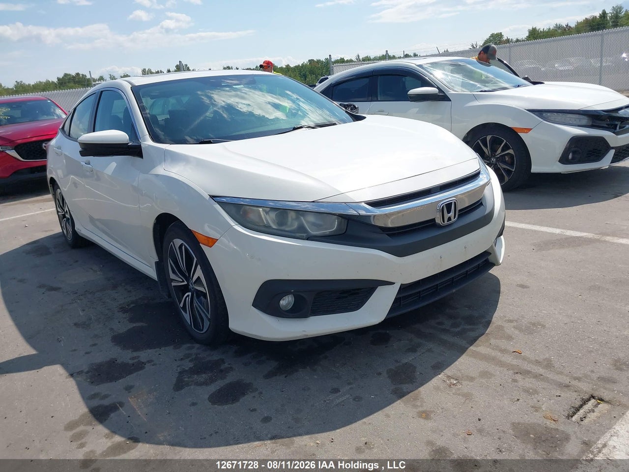2HGFC1F41GH100908 · 2016 HONDA CIVIC EX