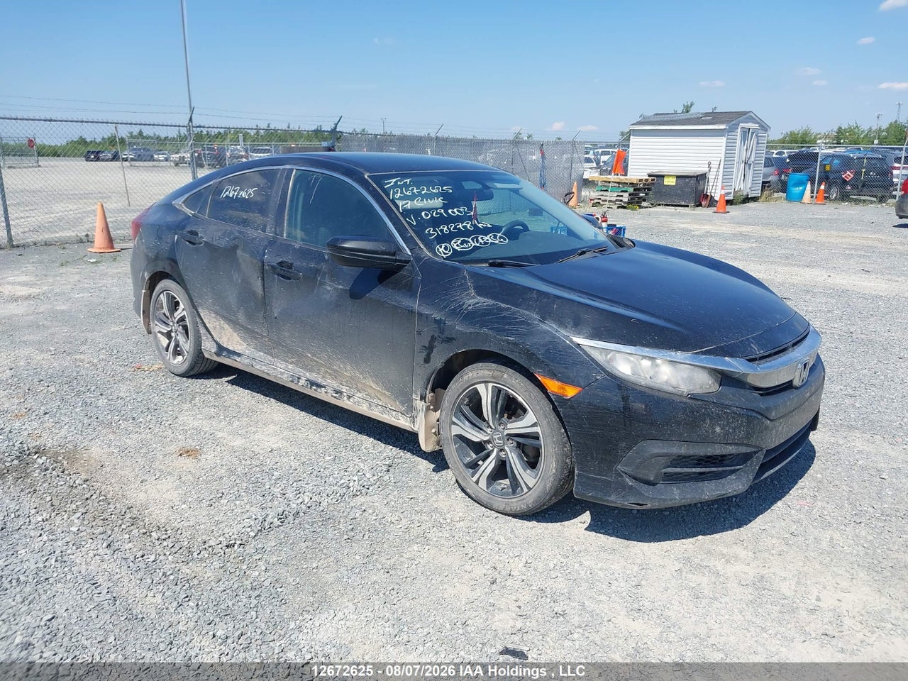 2HGFC2E53HH029003 · 2017 HONDA CIVIC LX