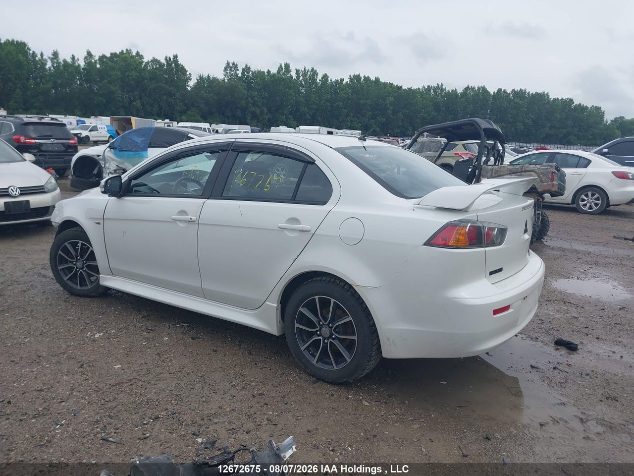 JA32U2FUXGU600979 · 2016 MITSUBISHI LANCER · 3/16