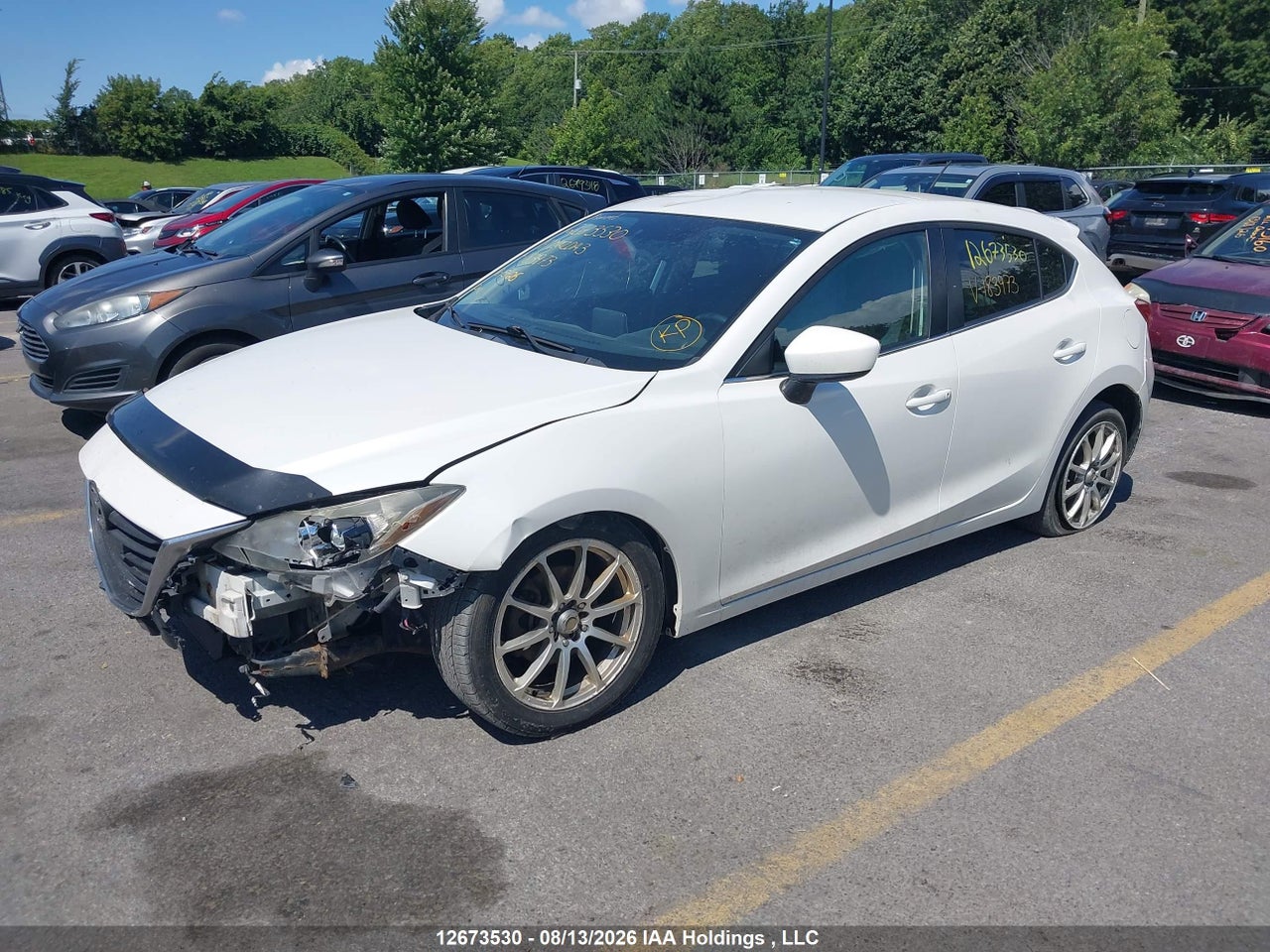 JM1BM1L73E1183973 · 2014 MAZDA MAZDA3 GS-SKY · 2/18