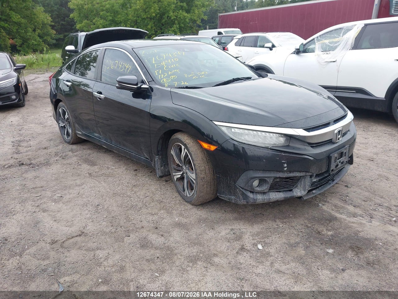 2HGFC1F93HH104410 · 2017 HONDA Civic touring