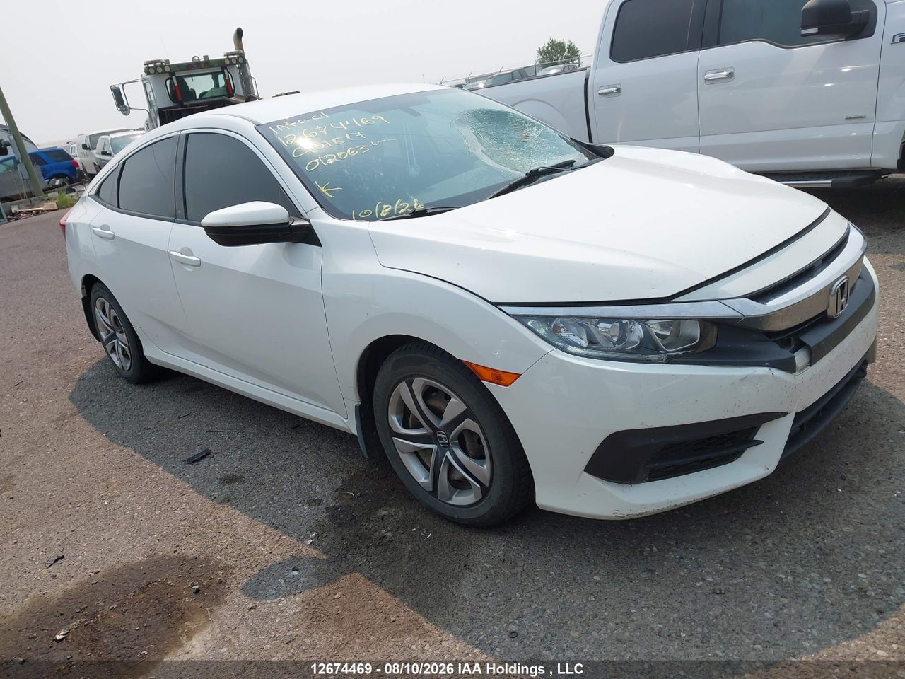 2HGFC2E52HH012063 · 2017 HONDA CIVIC LX