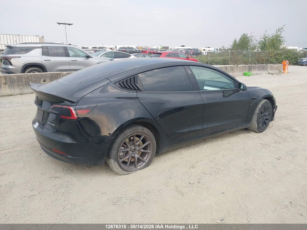 5YJ3E1EBXNF244892 · 2022 TESLA MODEL 3 LONG RANGE · 4/18
