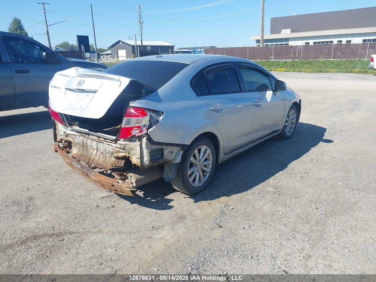 2HGFB2F92CH005207 · 2012 HONDA CIVIC EX-L · 4/19