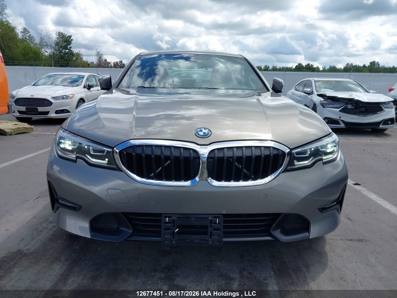 WBA5P9C06NFN11795 · 2022 BMW 330E XDRIVE · 12/19