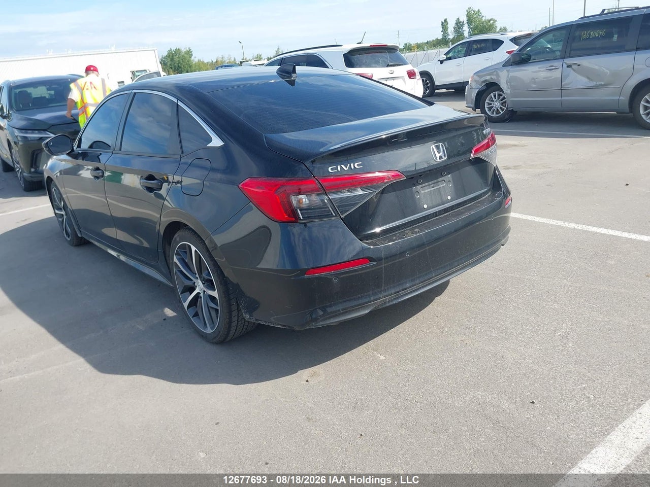 2HGFE1F98PH002710 · 2023 HONDA Civic touring · 3/18