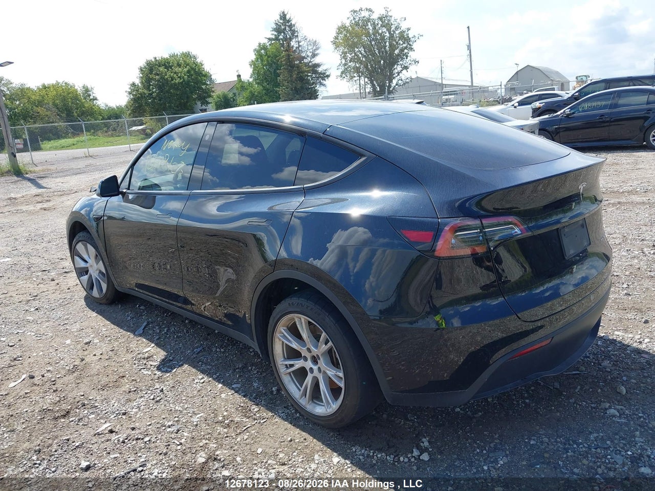LRWYGDEE9PC027374 · 2023 TESLA MODEL Y LONG RANGE · 3/16