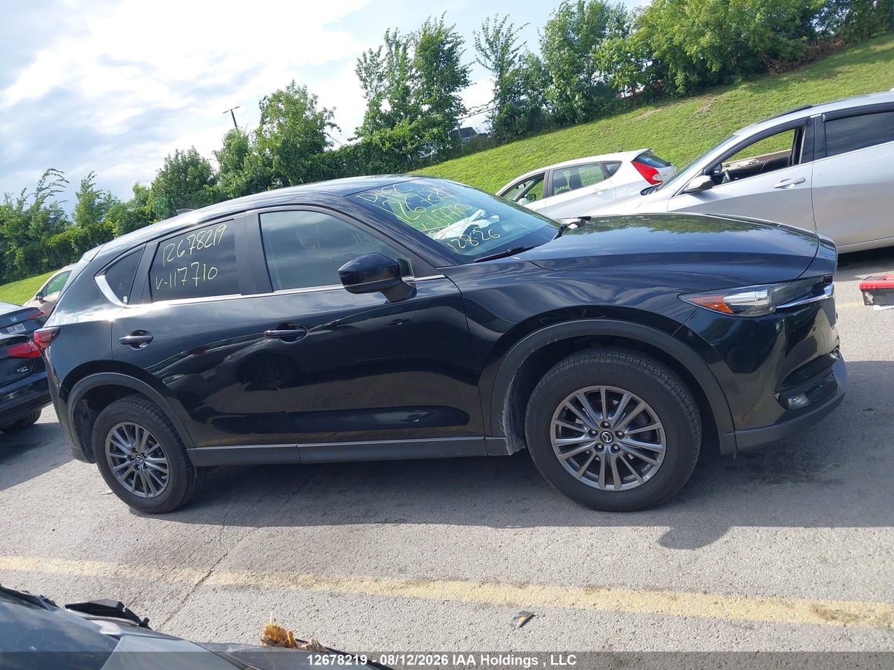 JM3KFBCM2M0117710 · 2021 MAZDA CX-5 TOURING · 12/18