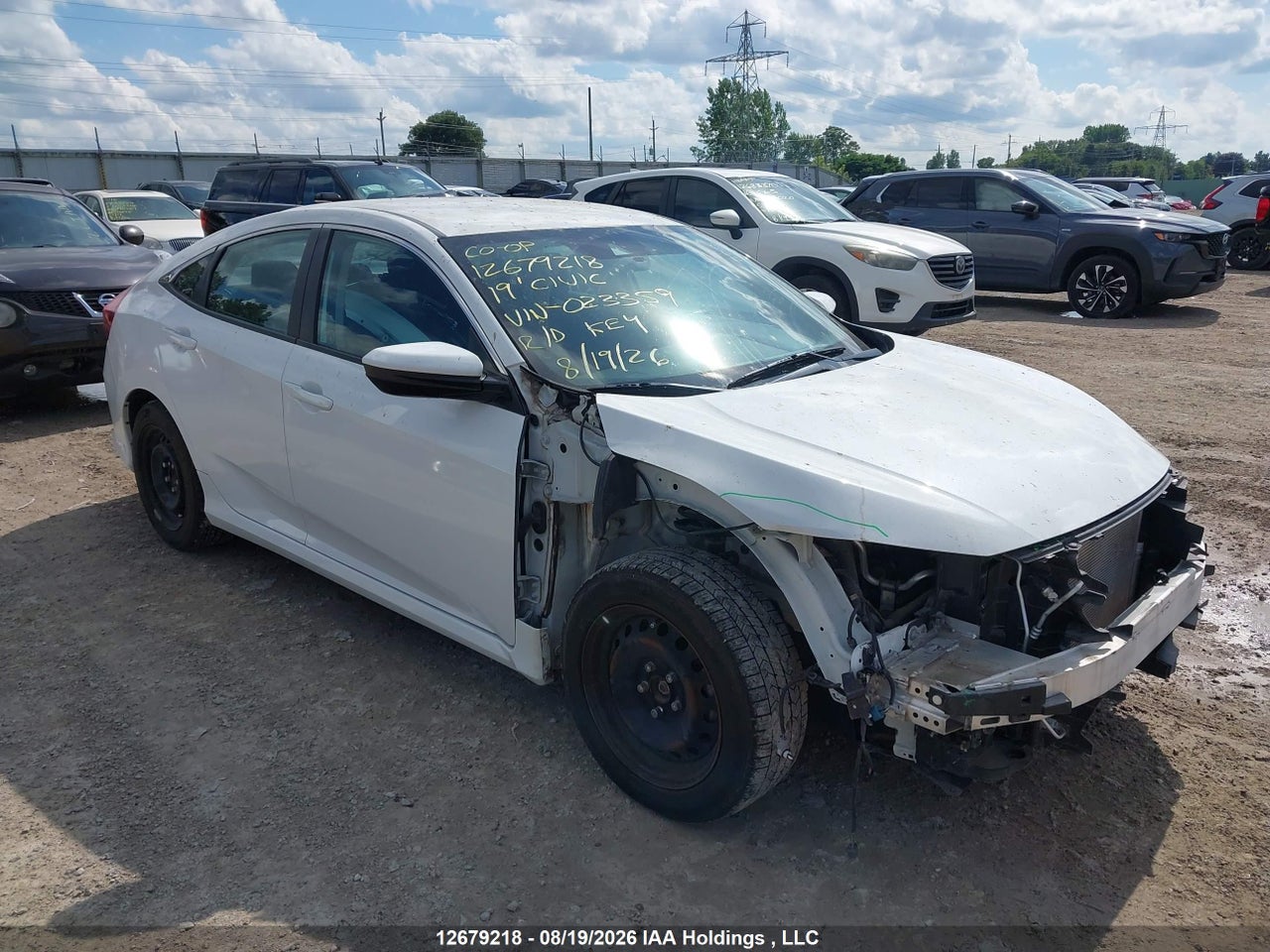 2HGFC2F54KH023359 · 2019 HONDA CIVIC LX