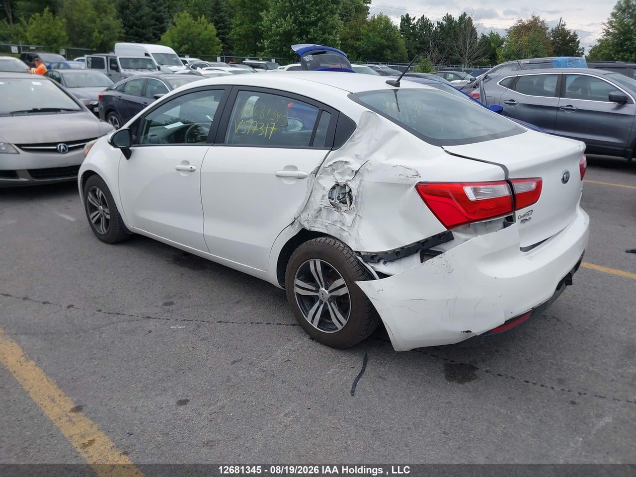 KNADM4A33F6517317 · 2015 KIA RIO LX · 3/21