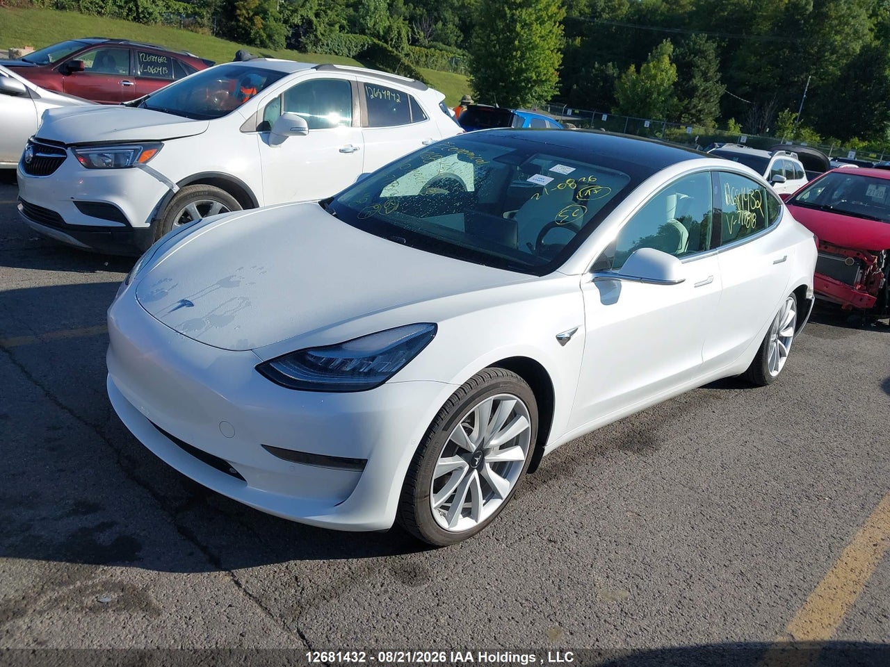 5YJ3E1EA3LF717813 · 2020 TESLA MODEL 3 STANDARD RANGE PLUS · 2/18