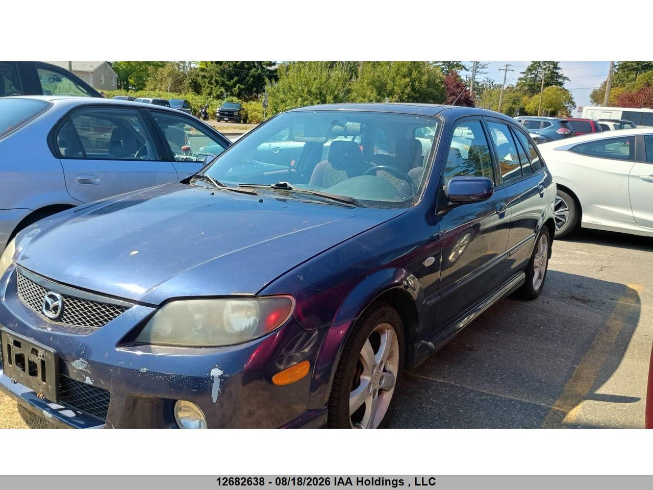 JM1BJ245231131436 · 2003 MAZDA PROTEGE5
