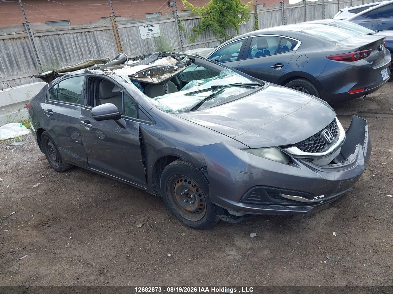 2HGFB2F42FH017074 · 2015 HONDA CIVIC LX