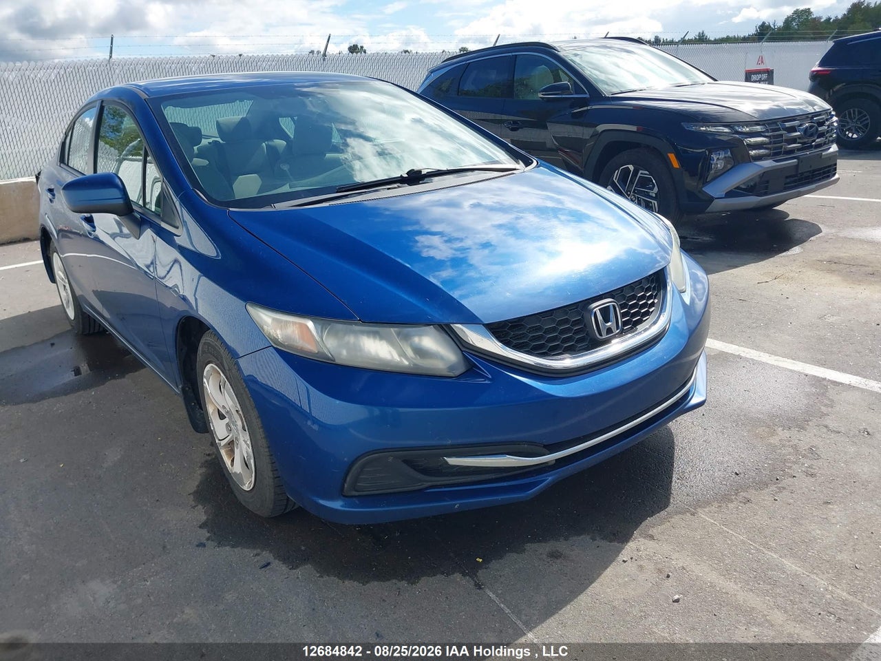 2HGFB2F40FH028817 · 2015 HONDA CIVIC LX