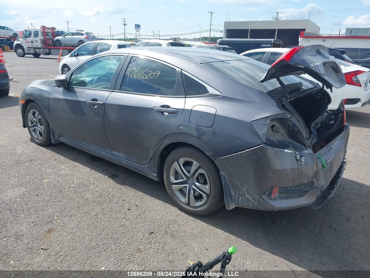 2HGFC2E59GH006193 · 2016 HONDA CIVIC LX · 3/21